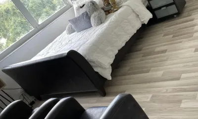 Freshly made bedroom in a Little Havana-style bungalow after an Ire Cleaning Services clean