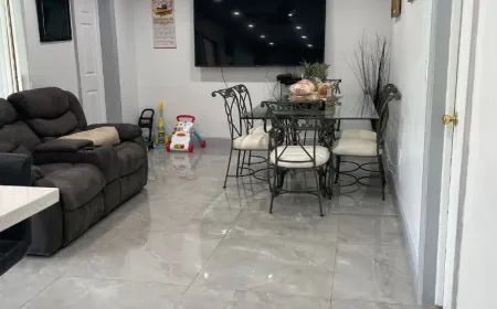 Family living room with polished tile floors after an Ire Cleaning Services house cleaning